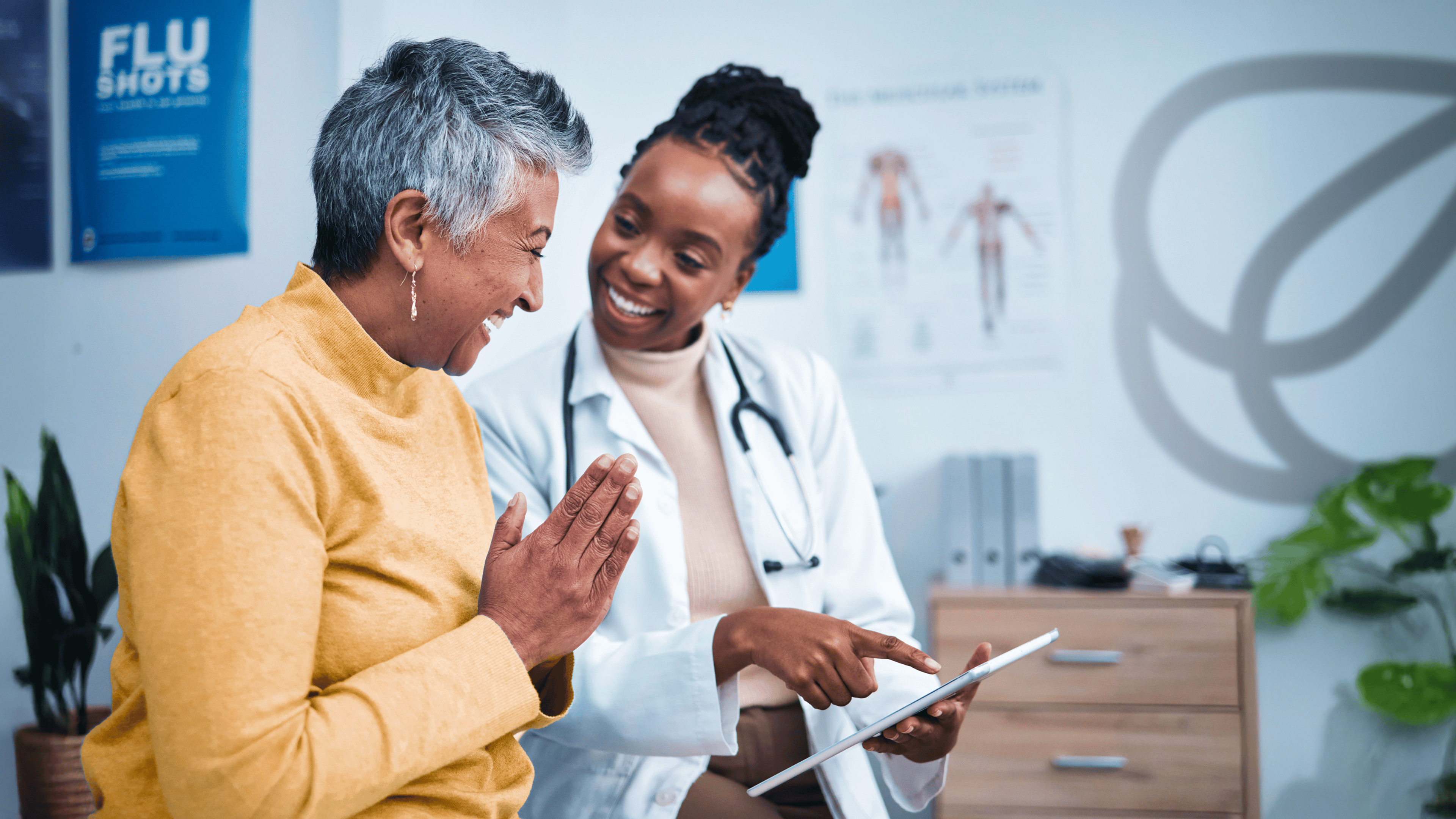 Black woman, doctor and elderly patient with good news, tablet and results for health, advice and report.
