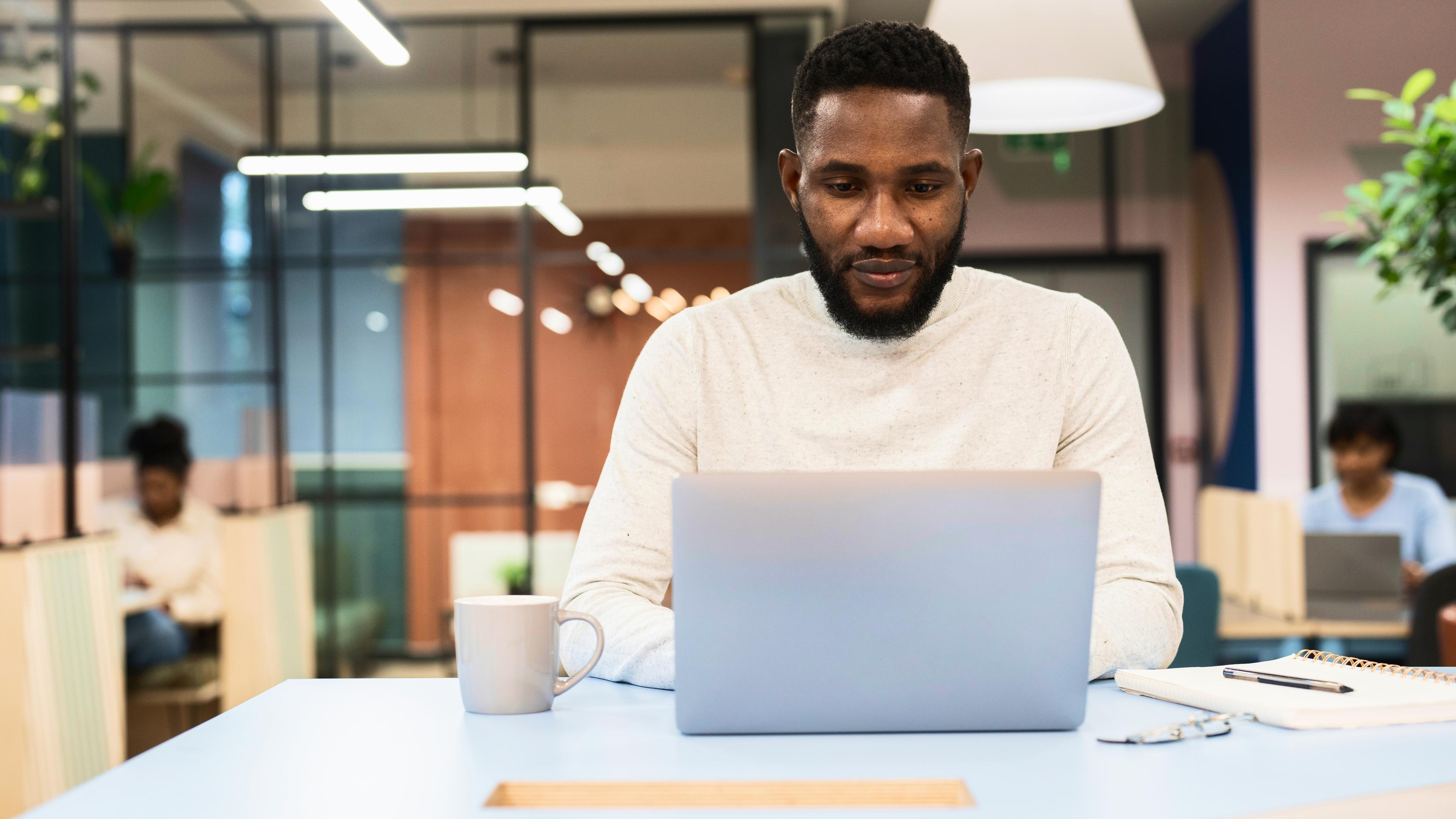 Young serious busy professional business woman employee or student using laptop watching online webinar or training web course, looking at computer, thinking, elearning, doing research concept.