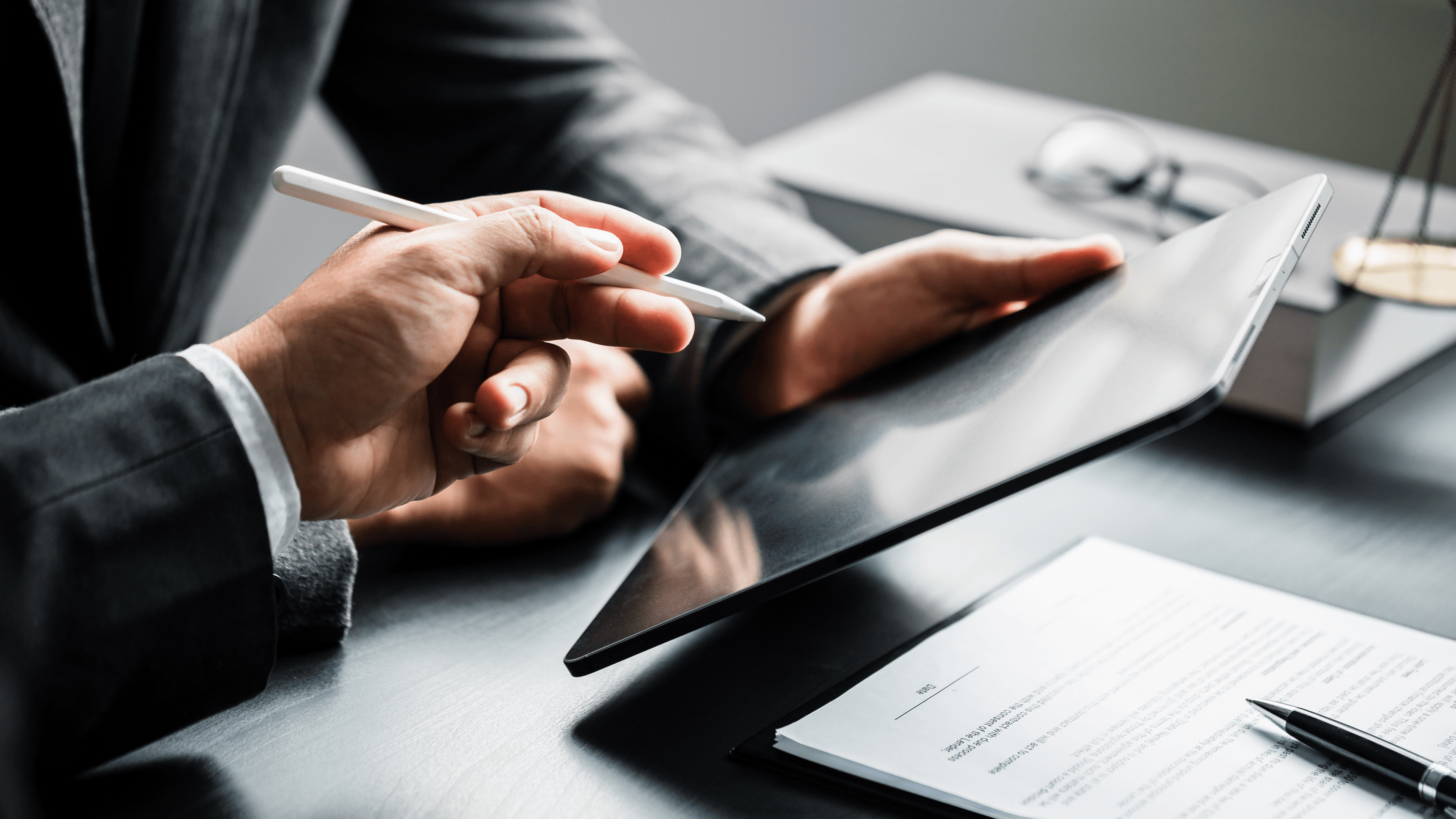 Close up of businessman or lawyers discussing about contract or business agreement at law firm office.