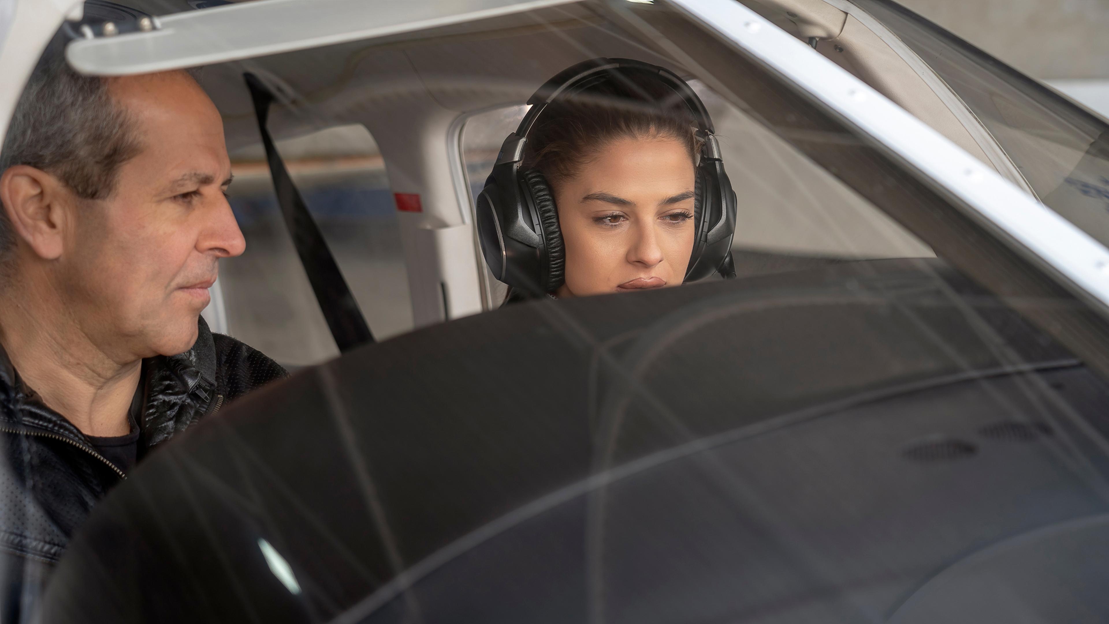 Flight school student flying the plane.