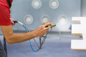 Low noise compressor for paint spray