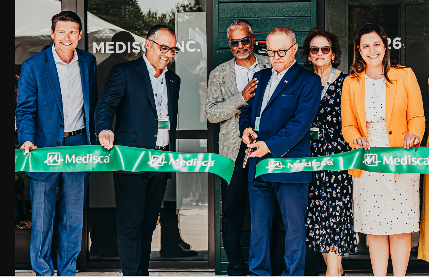 PB grand opening ribbon cutting.jpg