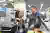 people-looking-at-plastic-manifold.webp