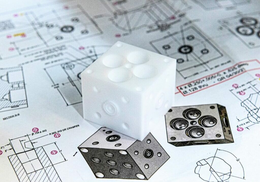 plastic-part-on-top-of-plans.jpg