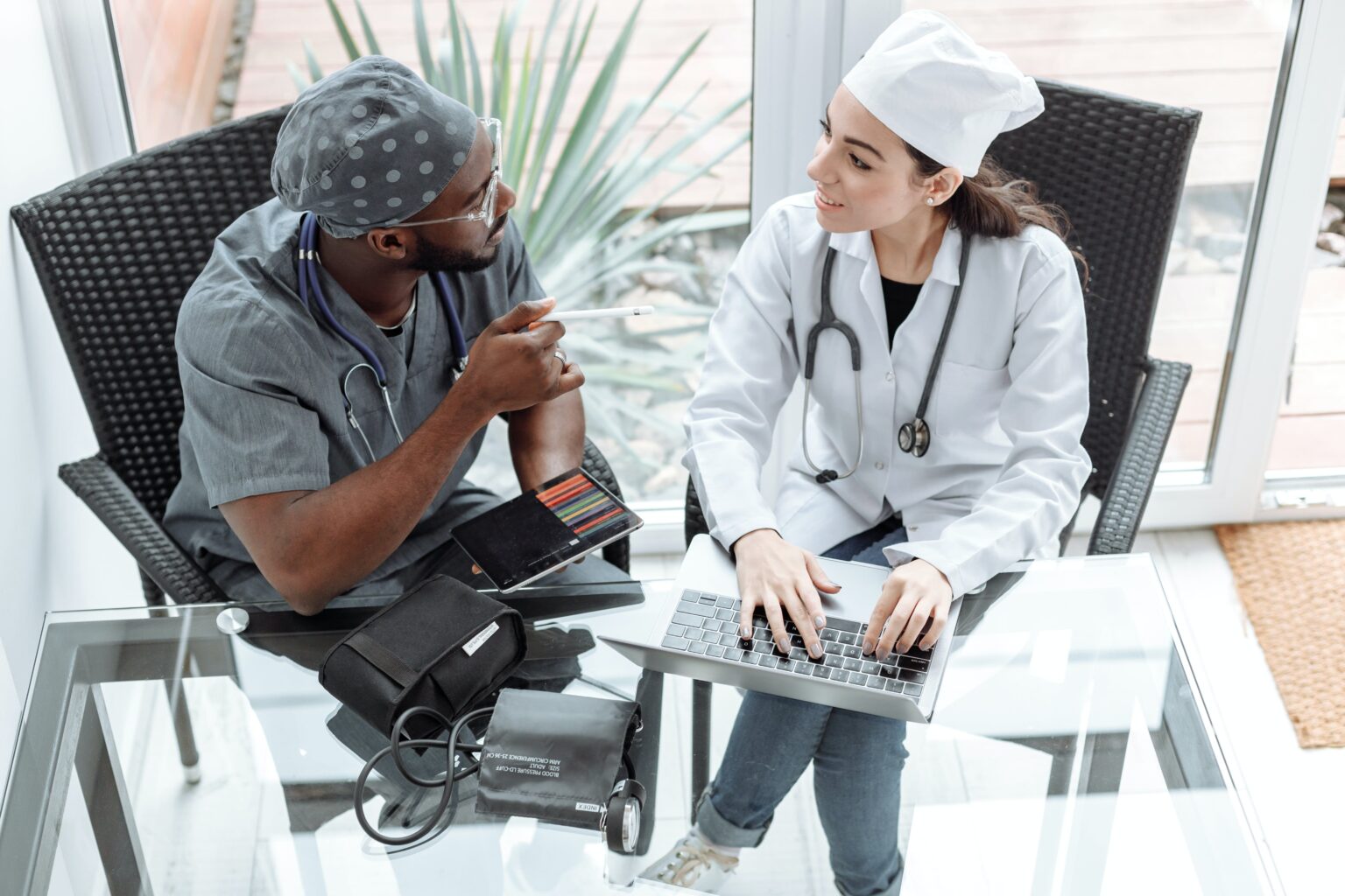 two-doctors-talking-at-desk-1536x1024.jpg