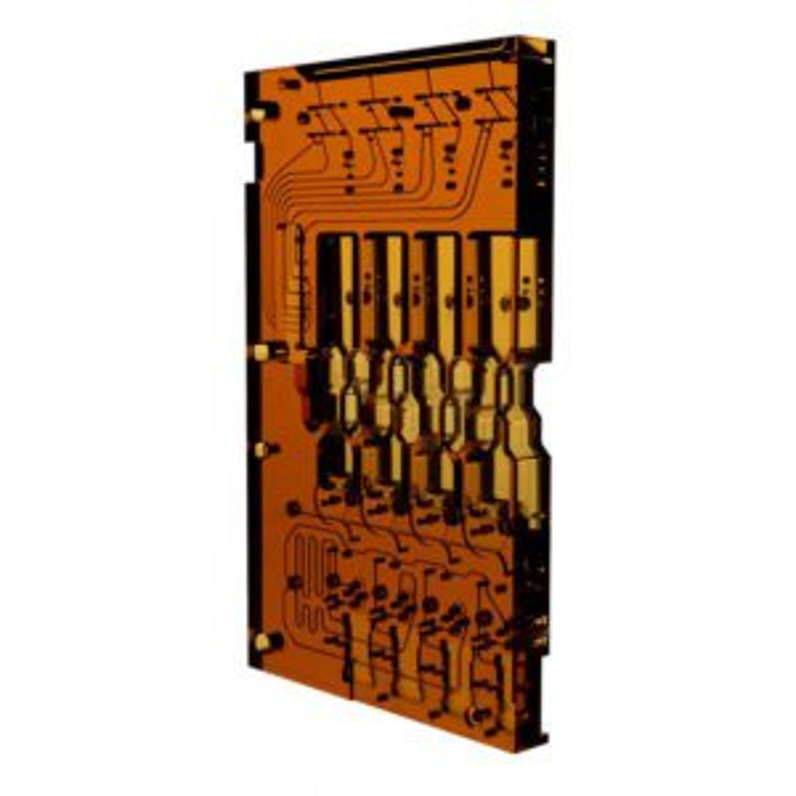 A transparent, amber-colored Radel plastic manifold with visible fluidic pathways and reservoirs, standing upright against a white background.
