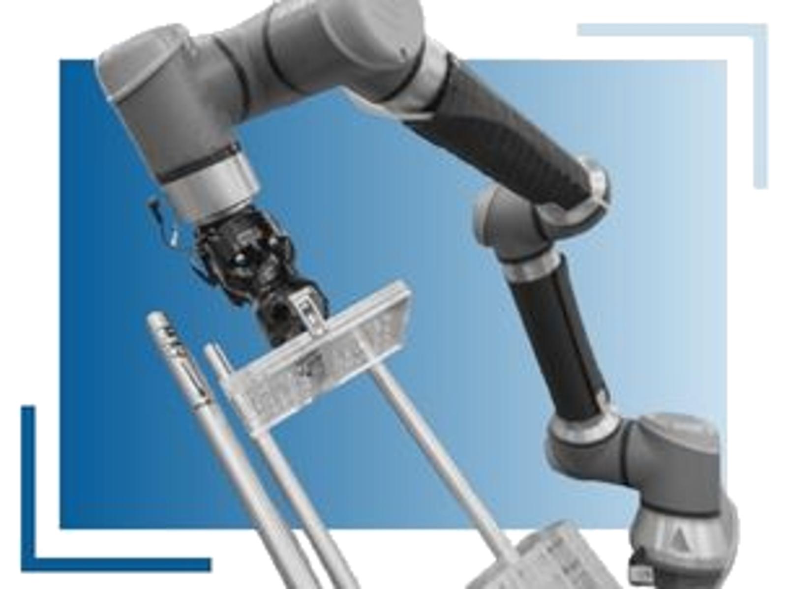 Black and white cnc machine robot on a blue gradient background