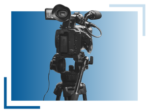 A professional video camera mounted on a tripod stands against a blue gradient background with decorative corner lines.