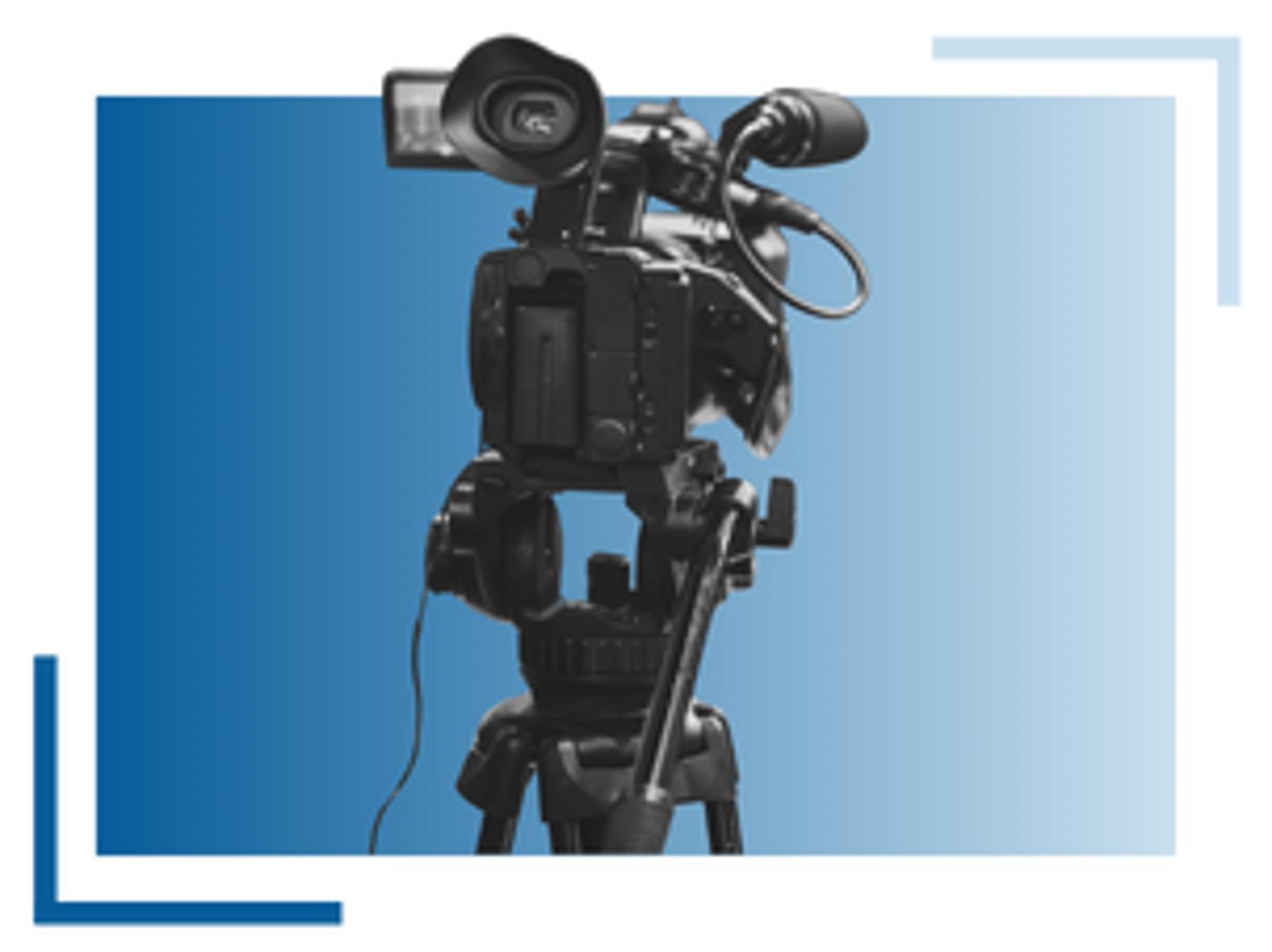 A professional video camera mounted on a tripod stands against a blue gradient background with decorative corner lines.