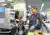 two-people-in-factory-talking-scaled-landscape.jpg