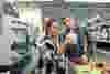 people-inspecting-plastic-manifold.jpg