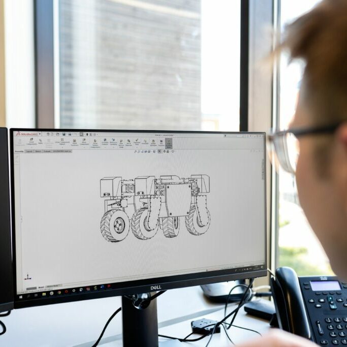 person-3d-image-plans-computer-1024x683-square.jpg