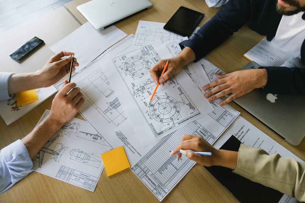hands-on-white-engineering-plans-1024x683.jpg
