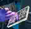 purple-gloved-hand-cleaning-plastic-manifold.jpg