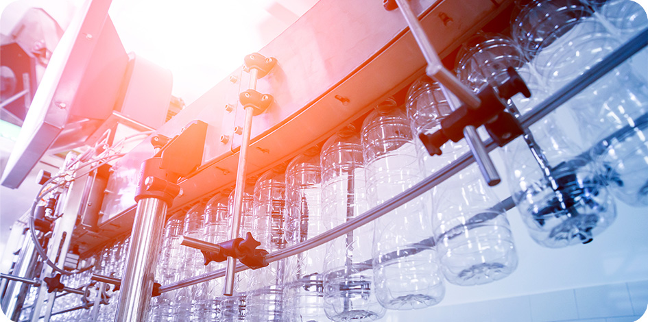 Plastic blow molding production line requiring controlled cooling for consistent bottle quality.