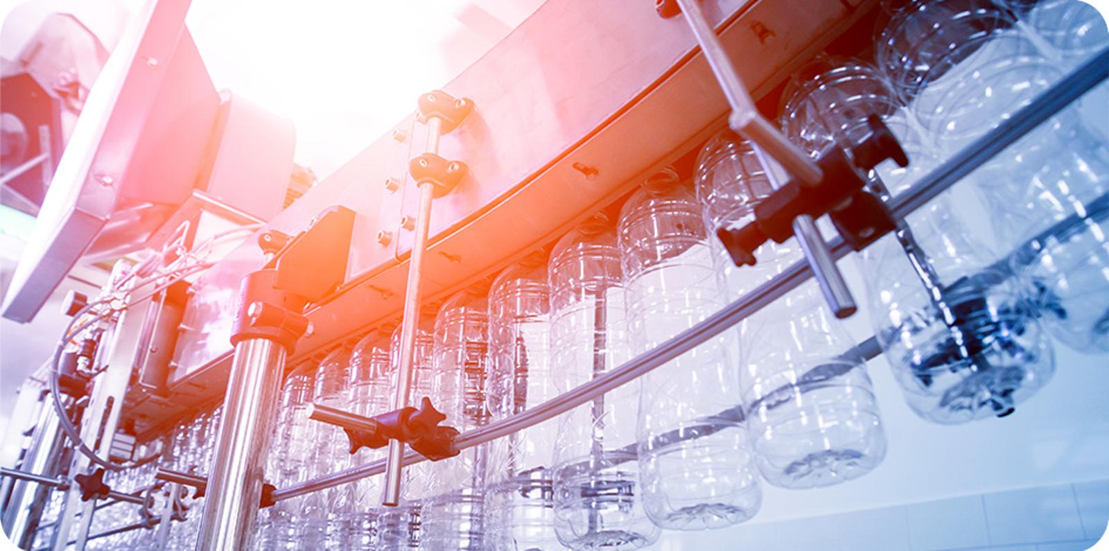 Plastic blow molding production line requiring controlled cooling for consistent bottle quality.