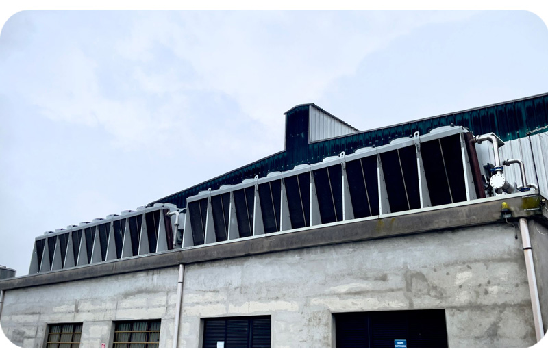 Outdoor industrial dry cooler installed on an oil and gas facility to improve process cooling efficiency