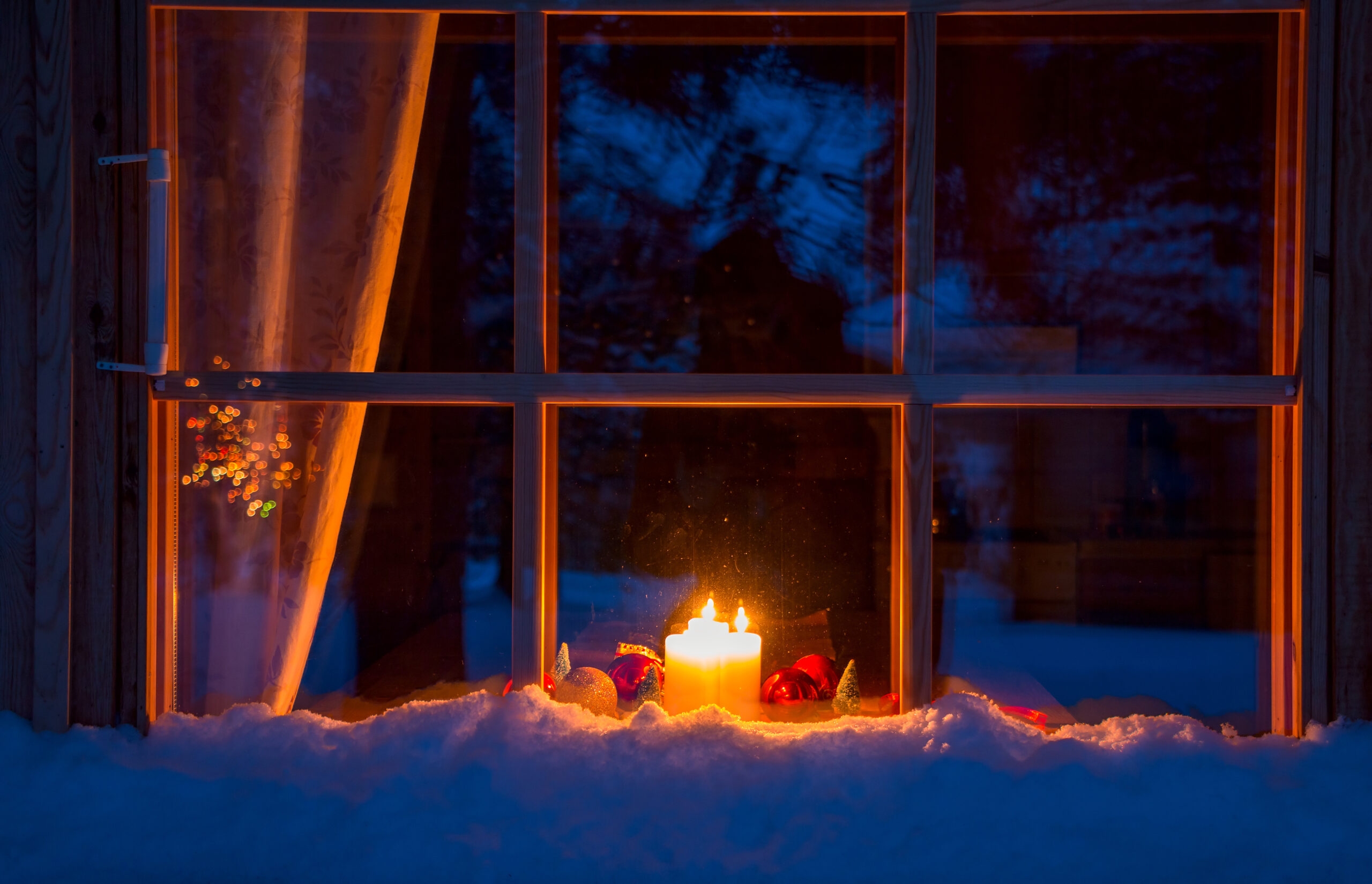 The History Of Holiday Candles In The Windows