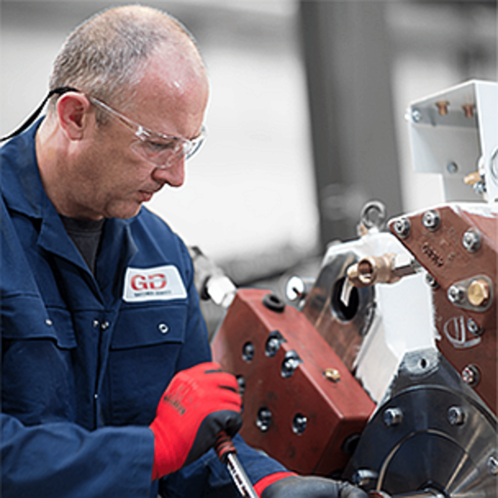 high pressure piston compressor-Reavell technician.png