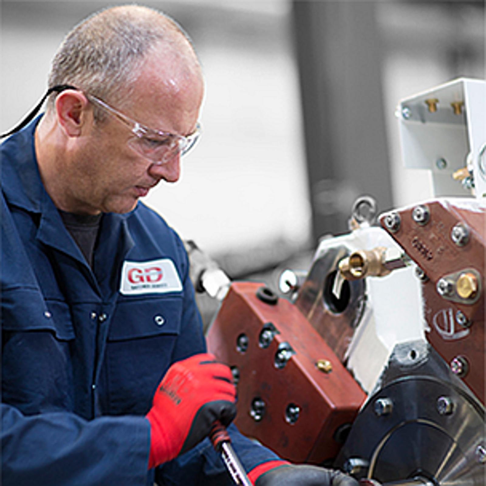 high pressure piston compressor-Reavell technician.png