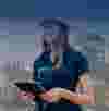Woman observing machinery