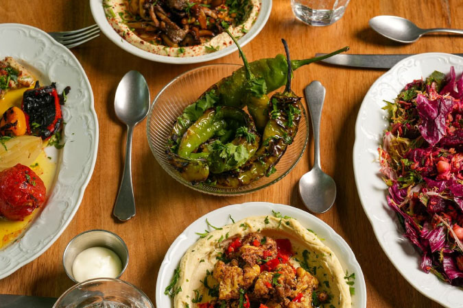 A colorful array of fresh dishes from Suraya, a specialty market, restaurant, and garden in Philadelphia.