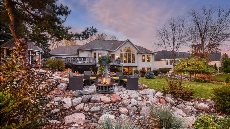 View from the backyard of a large, residential home in Shorewood, Minnesota.