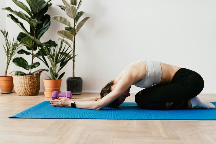 Yoga Poses to Reduce Stress Childs Pose pexels-karola-g-4498168.jpg