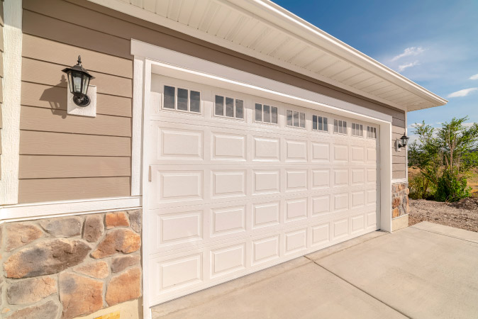Exterior view of a newly installed garage door — one of the top garage conversion ideas for the exterior.