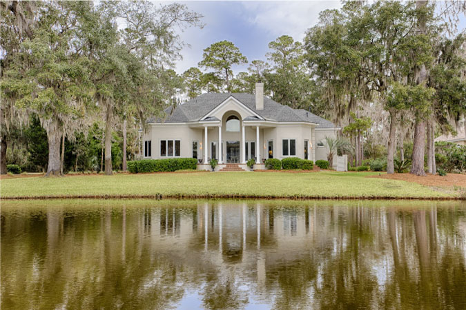 A large, single-family home with a waterfront view on Skidaway Island in Savannah, Georgia