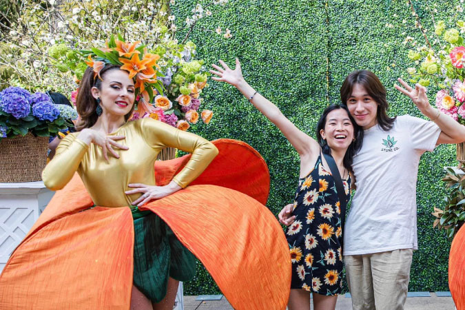 A dancer is a colorful dress at Atlanta's Botanical Garden's Garden Party