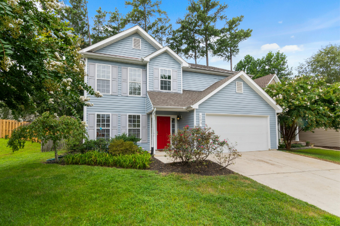 A light blue, two-story house in Avondale, one of the best neighborhoods in Jacksonville.