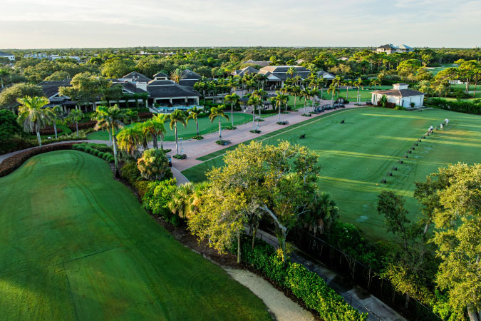 Aerial view of the golf course and surrounding neighborhood at Bonita Bay Club in Bonita Springs, Florida.