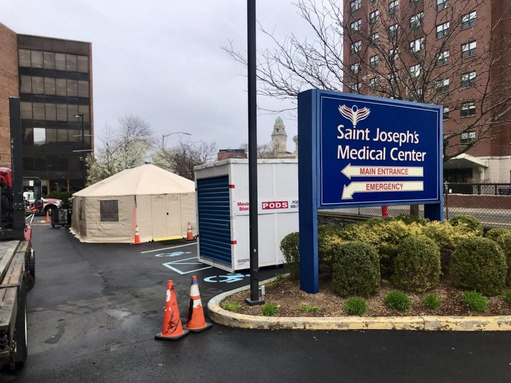 A PODS container in a hospital parking lot to help with Coronavirus care