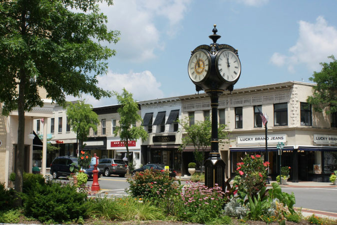 A quaint commercial street in the village of Ridgewood, New Jersey, on a sunny day.