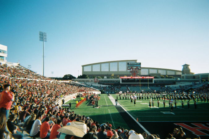Fans gather at the football field at Texas Tech University, located in Lubbock, TX