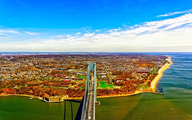 An aerial view of Verrazano Narrows Bridge and Staten Island — one of the five boroughs of New York.