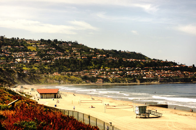 The view down Torrance Beach in Torrance, California, on a sunny summer day.