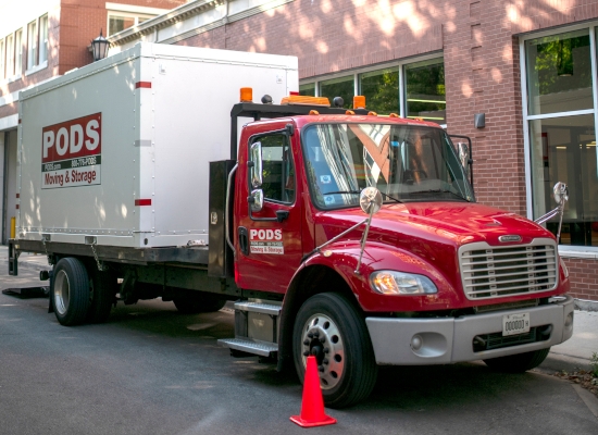 PODS truck in a city
