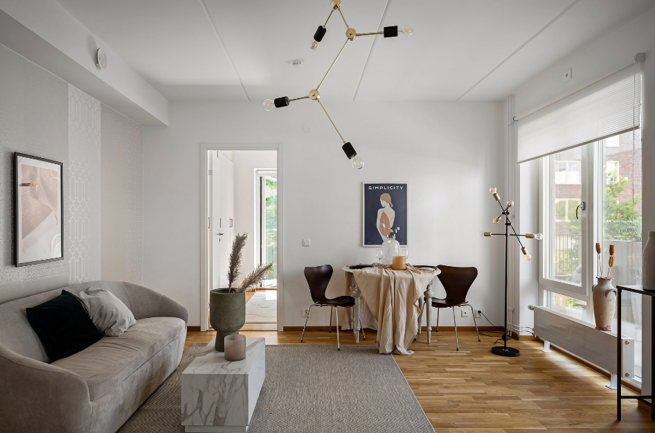 A small living room that has been fully decorated.