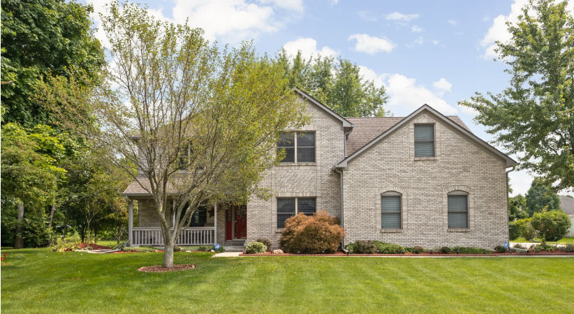 A two-story, brick home in Pittsboro, Indiana.