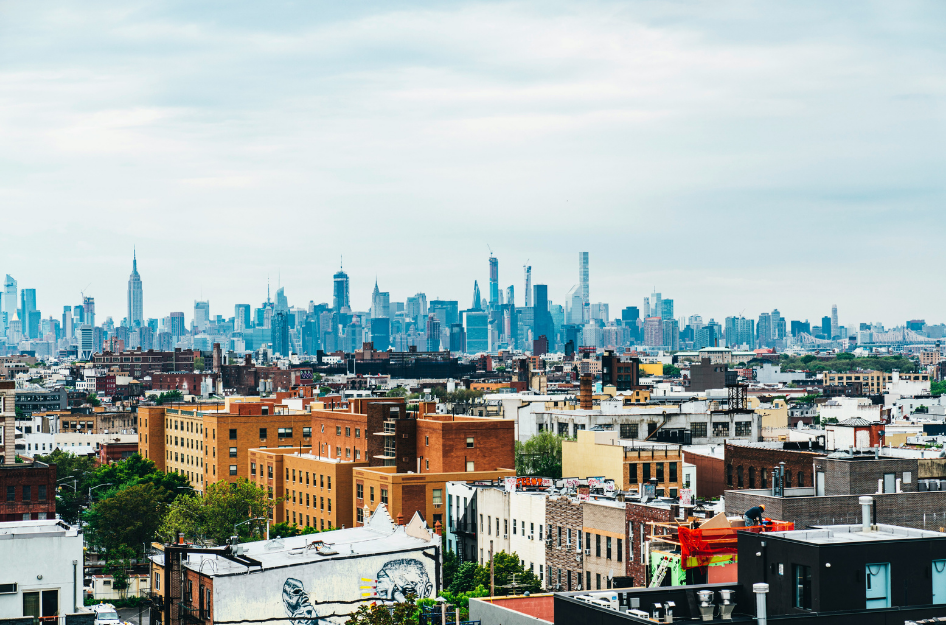 A view of the NYC skyline from one of the best NYC neighborhoods, Bushwick in Brooklyn, NY.