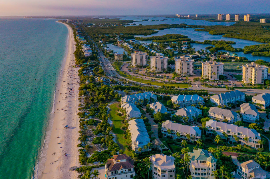 Aerial view of Barefoot Beach and Bonita Beach in Bonita Springs, Florida, just before sunset.