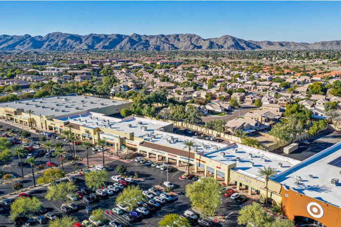 Aerial view of Ahwatukee Foothills Towne Center and the surrounding residential neighborhoods and foothills. 