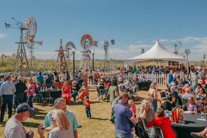 Hundreds of people enjoy a sunny day in West Texas, tasting offerings from wineries across the state at Lubbock Uncorked.