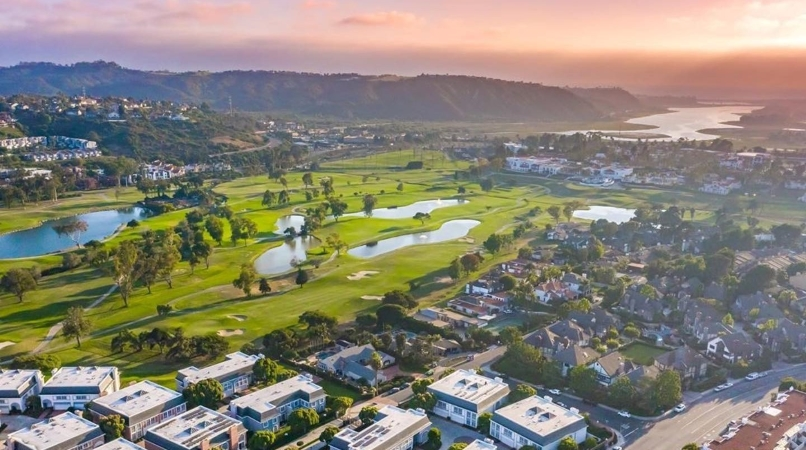 Aerial view of a golf course and residential neighborhood in Carlsbad, CA — one of the best places to live in the San Diego area, though not technically one of the San Diego neighborhoods.