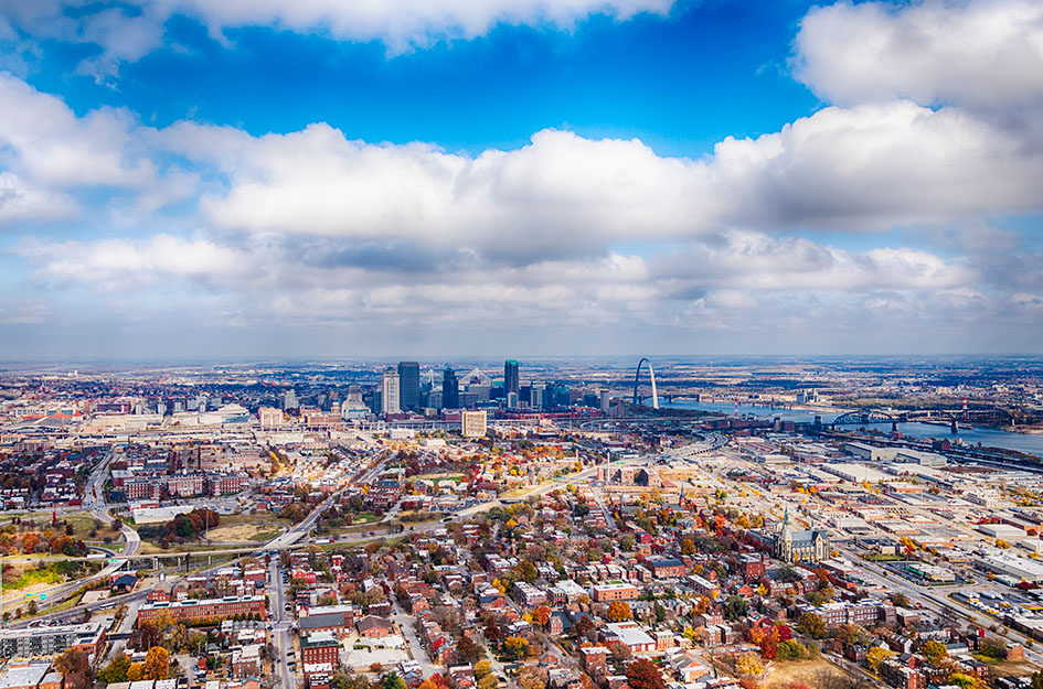 A wide angle aerial view of St. Louis and its surrounding communities during the day