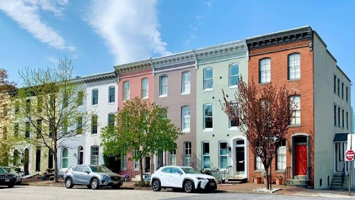 Locals enjoying a sunny day at Federal Hill Park in the Federal Hill neighborhood of Baltimore, Maryland. 