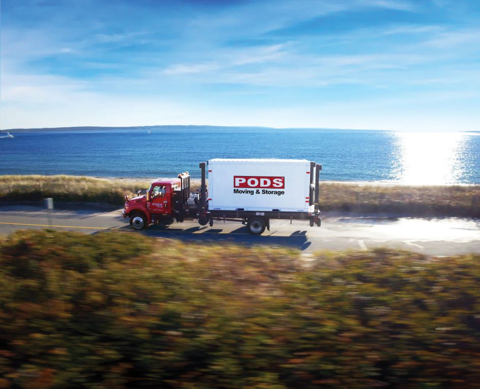 A PODS truck drives down the highway while making a long distance relocation an adventure for its customer.