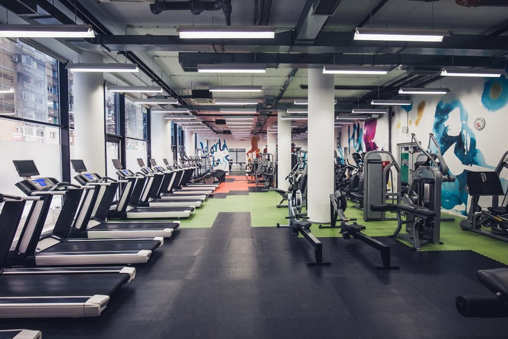 An empty gym with fitness and exercise equipment